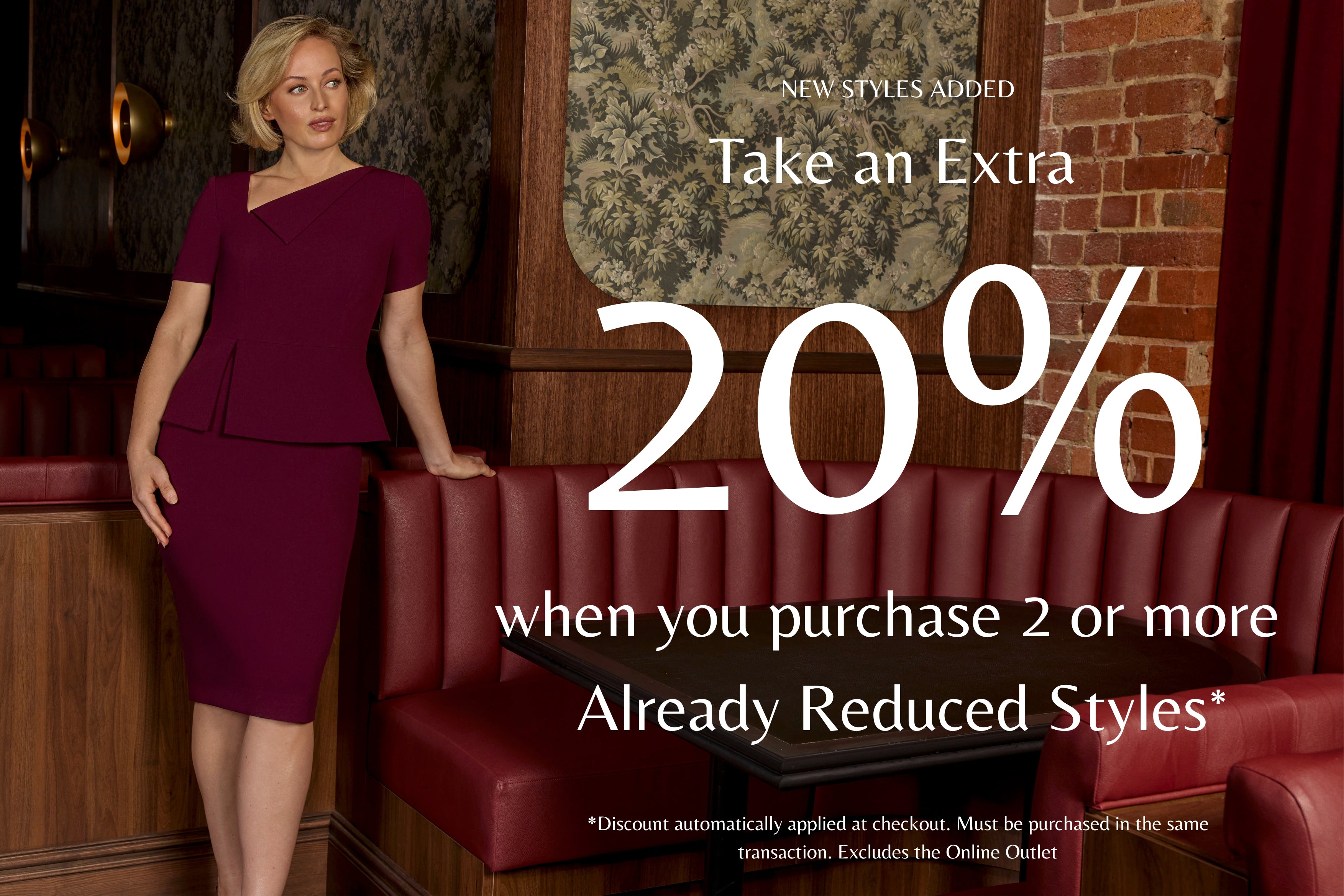 A promotional advertisement featuring a woman in a dark burgundy dress standing in a restaurant booth, with large white text reading 'Take an Extra 20% off when you purchase 2 or more Already Reduced Styles*' and smaller text about new styles added.