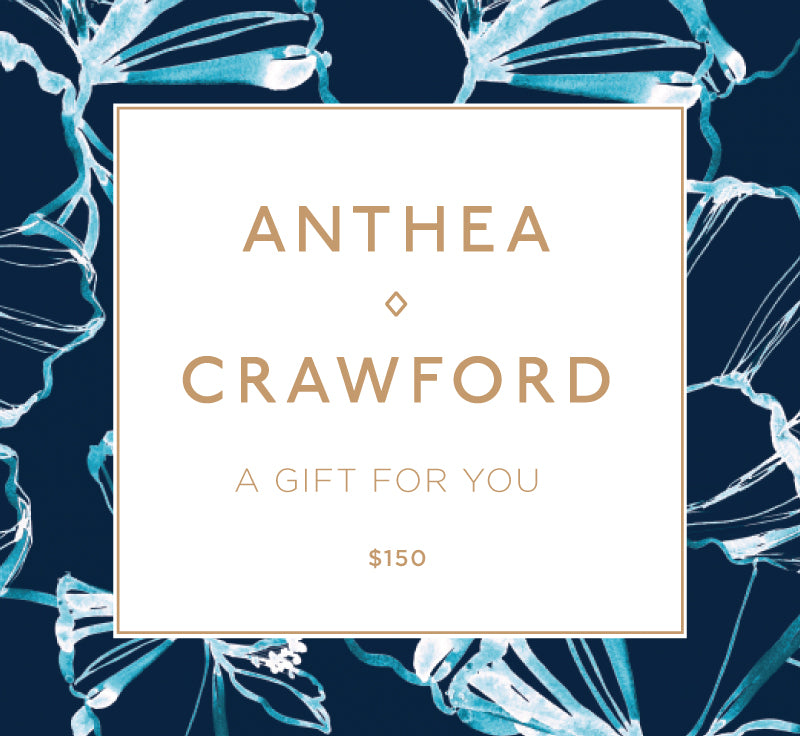 Gift certificate for 'Anthea Crawford' with floral design on a dark blue background. $150 Online Gift Card