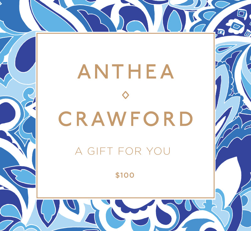 Gift card with blue and white pattern and 'Anthea Crawford' branding. $100 Online Gift Card
